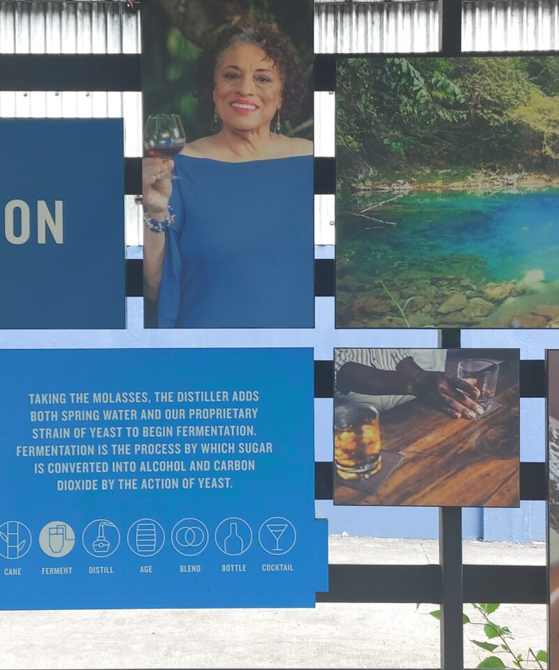 A display at the fermentation station shows the Appleton Estate master blender’s picture in the center, surrounded by panels and visuals of the different elements that contribute to the rum fermentation process.